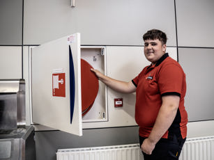 Student beveiliging bij de brandslang